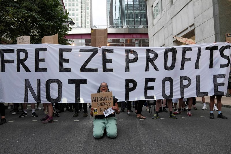 &copy; Reuters. FILE PHOTO: Demonstrators block a street in Canary Wharf during a protest outside the Ofgem headquarters, following the energy price cap announcement, in London, Britain, August 26, 2022. REUTERS/Maja Smiejkowska/