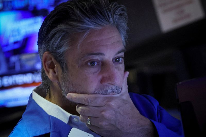 &copy; Reuters. FILE PHOTO: A trader works on the floor of the New York Stock Exchange (NYSE) in New York City, U.S., August 29, 2022.  REUTERS/Brendan McDermid