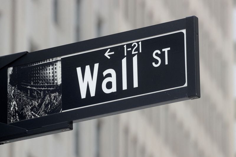 &copy; Reuters. FILE PHOTO: The Wall St. sign is seen near the New York Stock Exchange (NYSE) in New York City, U.S., May 4, 2021.  REUTERS/Brendan McDermid/File Photo