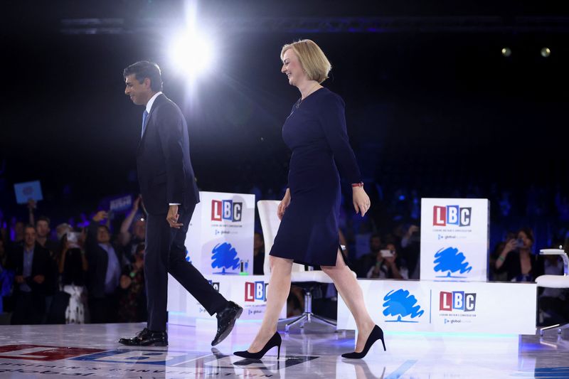 &copy; Reuters. FILE PHOTO: Conservative leadership candidates Liz Truss and Rishi Sunak walk together out of the stand as they attend a hustings event, part of the Conservative party leadership campaign, in London, Britain August 31, 2022. REUTERS/Hannah McKay