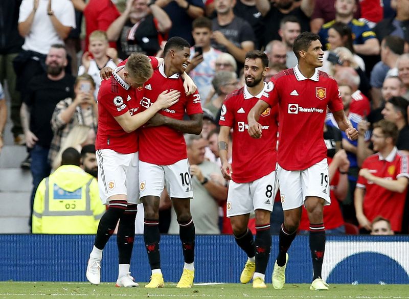 &copy; Reuters. Soccer Football - Premier League - Manchester United v Arsenal - Old Trafford, Manchester, Britain - September 4, 2022 Manchester United's Marcus Rashford celebrates scoring their third goal with Scott McTominay, Bruno Fernandes and Raphael Varane REUTERS