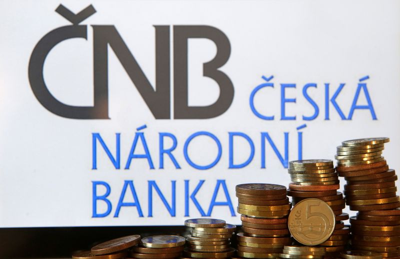 &copy; Reuters. FILE PHOTO: Czech Crown coins are seen in front of a displayed logo of Czech central bank (CNB) in this picture illustration taken April 1, 2017. REUTERS/David W Cerny/Illustration