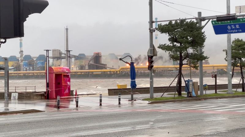 POSCO says fire put out at S.Korea steel plant, production halted due to flooding