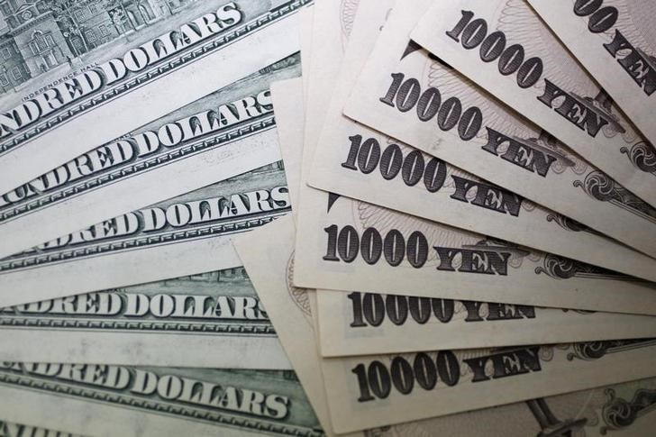 &copy; Reuters. 　９月６日、午後の東京外為市場でドルが一時１４０．９７円まで上昇。今月２日の高値を小幅に上抜け、１９９８年８月以来、約２４年ぶりのドル高／円安水準を付けた。写真は都内で２