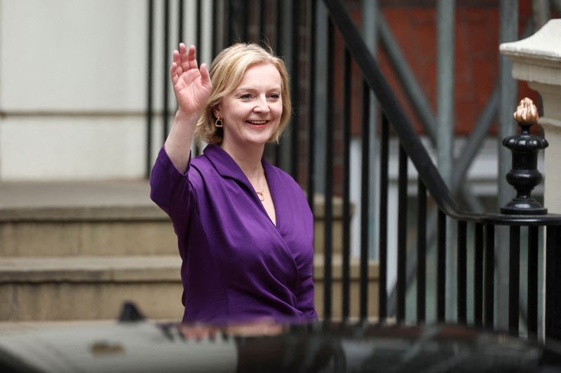 &copy; Reuters. Liz Truss gestures outside the Conservative Party headquarters, after being announced as Britain's next Prime Minister, in London, Britain September 5, 2022. REUTERS/Phil Noble     