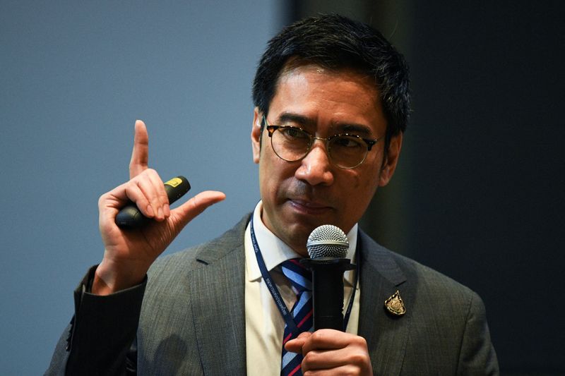 &copy; Reuters. FILE PHOTO: Bank of Thailand Governor Sethaput Suthiwartnarueput speaks during his first briefing on the economy and monetary policy after taking office in Bangkok, Thailand October 20, 2020. REUTERS/Chalinee Thirasupa/File Photo