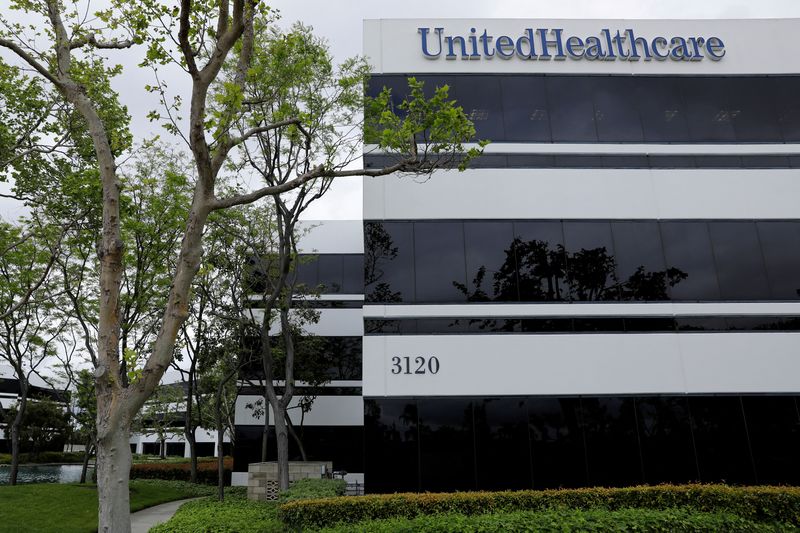 &copy; Reuters. FILE PHOTO: The corporate logo of the UnitedHealth Group appears on the side of one of their office buildings in Santa Ana, California, U.S., April 13, 2020.      REUTERS/Mike Blake