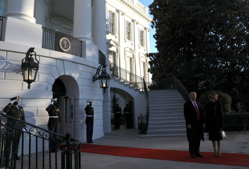 &copy; Reuters. FILE PHOTO: U.S. President Donald Trump and first lady Melania Trump leave the White House to board Marine One ahead of the inauguration of president-elect Joe Biden, in Washington, U.S., January 20, 2021. REUTERS/Leah Millis/File Photo