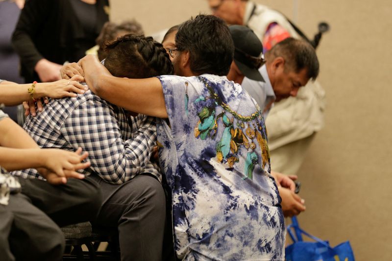 &copy; Reuters. Friends and relatives of Bonnie Burns, who was killed on at James Smith Cree Nation, comfort one another at a news conference in Saskatoon, Saskatchewan, Canada, September 7, 2022. REUTERS/Valerie Zink