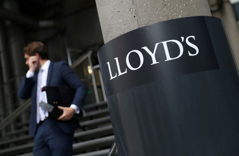 &copy; Reuters. FILE PHOTO: A man walks out of Lloyd's of London's headquarters in the City of London, Britain, July 31, 2018. REUTERS/Simon Dawson/File Photo  GLOBAL BUSINESS WEEK AHEAD