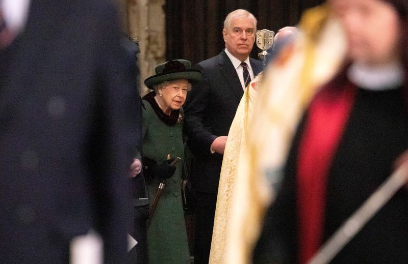 &copy; Reuters. FILE PHOTO: Britain's Queen Elizabeth, accompanied by Prince Andrew, Duke of York, attends a service of thanksgiving for late Prince Philip, Duke of Edinburgh, at Westminster Abbey in London, Britain, March 29, 2022. Richard Pohle/Pool via REUTERS
