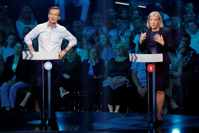 © Reuters. FILE PHOTO: Ulf Kristersson, leader of the Moderate party and Prime minister Magdalena Andersson, leader of the Social Democrats attend a political debate broadcasted on TV4 from Eskilstuna, Sweden, September 8, 2022.Christine Olsson/TT News Agency/via REUTERS     