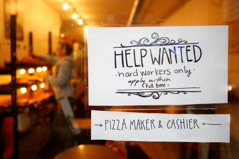 &copy; Reuters. FILE PHOTO: A "Help wanted" sign is seen in the window of a bakery in Ottawa, Ontario, Canada, November 2, 2017. REUTERS/Chris Wattie/File Photo