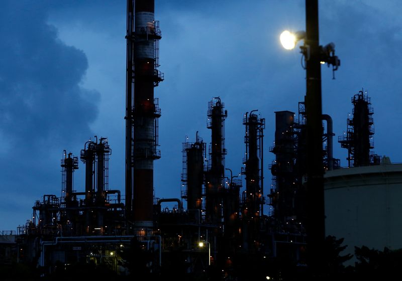 &copy; Reuters. FILE PHOTO: Factory chimneys are seen at Keihin industrial zone in Kawasaki, south of Tokyo, Japan, August 18, 2016. REUTERS/Kim Kyung-Hoon