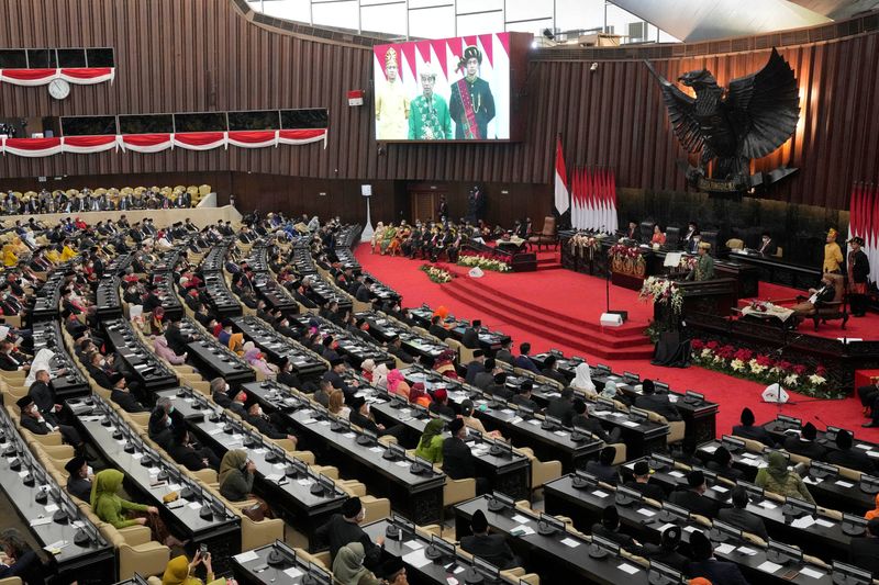 &copy; Reuters. Indonesian President Joko Widodo, wearing traditional attire from Bangka Belitung Islands, delivers his State of the Nation Address ahead of the country's Independence Day at the parliament building in Jakarta, Indonesia, August 16, 2022. Tatan Syuflana/P