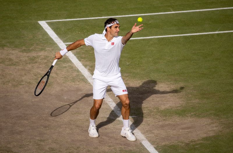 © Reuters. FILE PHOTO: Tennis - Wimbledon - All England Lawn Tennis and Croquet Club, London, Britain - July 7, 2021 Switzerland's Roger Federer in action during his quarter final match against Poland's Hubert Hurkacz Pool via REUTERS/David Gray