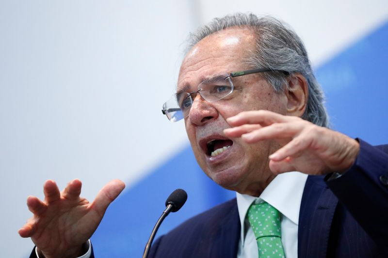 &copy; Reuters. FILE PHOTO: Economy Minister Paulo Guedes speaks during the launch ceremony of a government panel to monitor investments, in Brasilia, Brazil, May 9, 2022. REUTERS/Adriano Machado