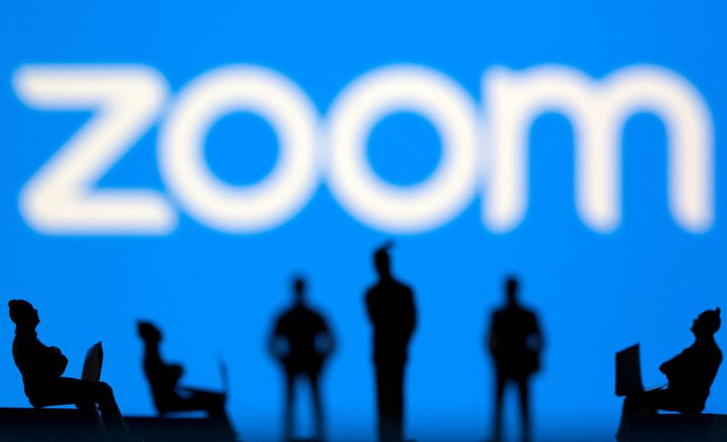 &copy; Reuters. FILE PHOTO: Small toy figures are seen in front of the Zoom logo in this illustration picture taken March 15, 2021. REUTERS/Dado Ruvic/Illustration