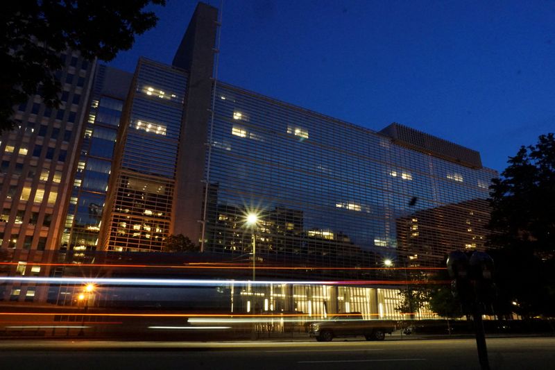 &copy; Reuters. FILE PHOTO: Vehicles pass in front of the World Bank building, which houses the International Centre for Settlement of Investment Disputes, in Washington, D.C. on May 20, 2022. Picture taken with a long exposure. Picture taken May 20, 2022.  REUTERS/Rapha