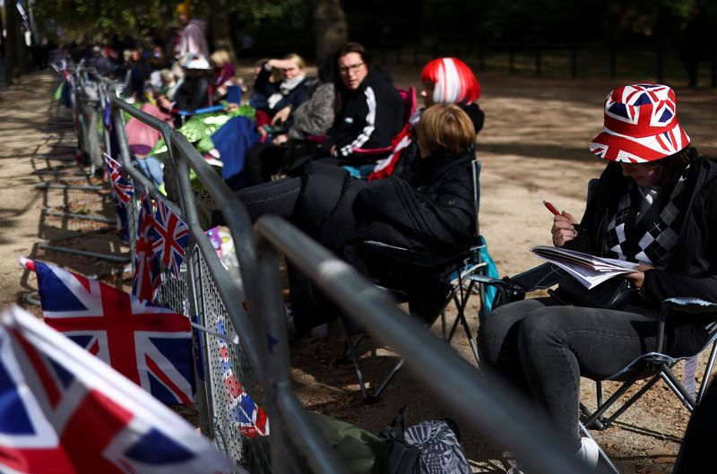 Royal fans camp out to get front row seats for the queen's funeral