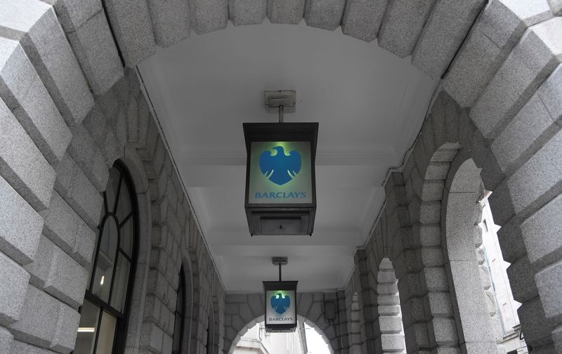 &copy; Reuters. FILE PHOTO: The logo of Barclays bank is seen on glass lamps outside of a branch of the bank in the City of London financial district in London September 4, 2017. REUTERS/Toby Melville