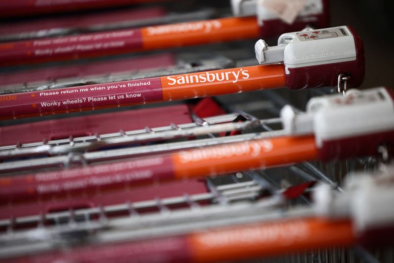 &copy; Reuters. Trolleys stacked together inside a Sainsbury’s supermarket in Richmond, west London, Britain, June 27, 2022. Picture taken June 27, 2022. REUTERS/Henry Nicholls