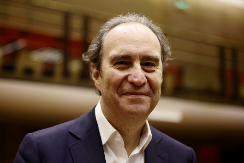 &copy; Reuters. Xavier Niel, fondateur du fournisseur d'accès Internet à haut débit français Iliad, arrive pour une audience sur la concentration de la propriété des médias dans le pays. /Photo prise le 18 février 2022 au Sénat français à Paris/REUTERS/Sarah M