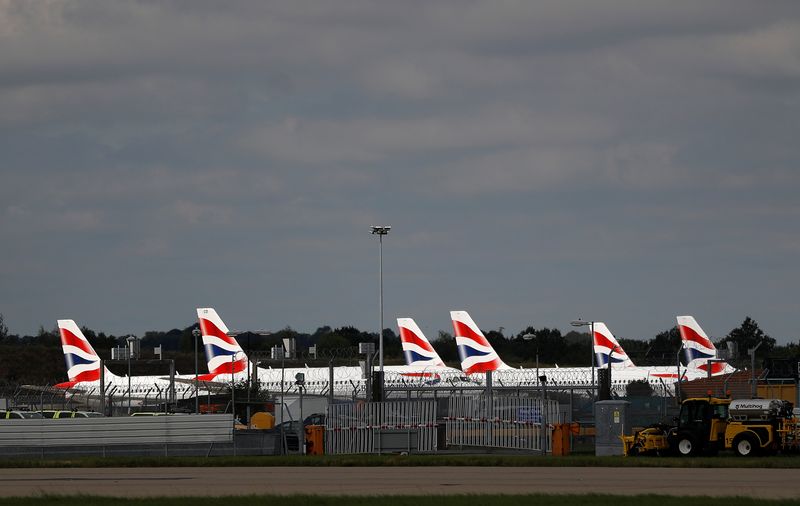 &copy; Reuters. FILE PHOTO: British Airways aircraft are parked at Gatwick Airport in Crawley, Britain, August 25, 2021.  REUTERS/Peter Nicholls