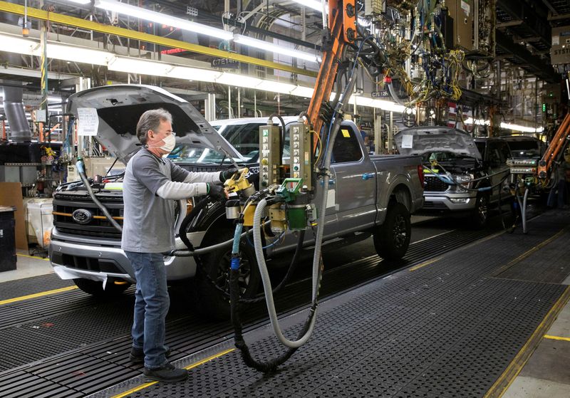 &copy; Reuters. FILE PHOTO: An assembly worker of Ford Motor works on the 40 millionth Ford Motor F-series pickup truck at the Dearborn Truck Plant in Dearborn, Michigan, U.S., January 26, 2022.  REUTERS/Rebecca Cook/File Photo