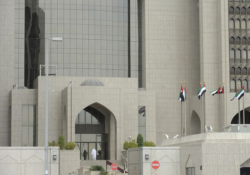 &copy; Reuters. FILE PHOTO: A man enters the main branch of UAE Central Bank in Abu Dhabi, January 29, 2013. REUTERS/Ben Job/File Photo