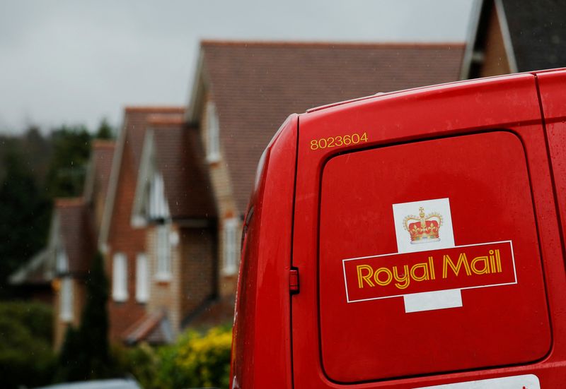 &copy; Reuters. FILE PHOTO: A Royal Mail postal van is parked outside homes in Maybury near Woking in southern England March 25, 2014. REUTERS/Luke MacGregor/File Photo