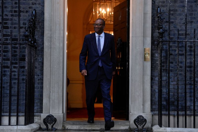 UK's Kwarteng to scrap top rate of income tax, cut basic rate from April