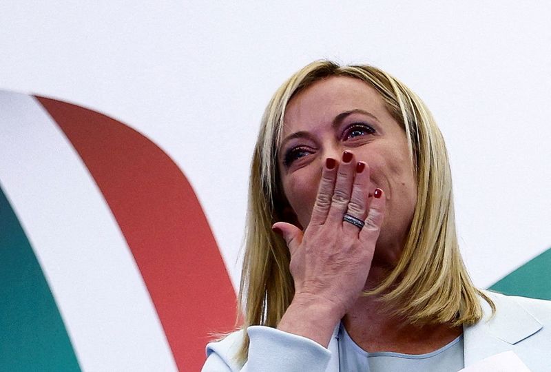 &copy; Reuters. Leader of Brothers of Italy Giorgia Meloni reacts at the party's election night headquarters, in Rome, Italy September 26, 2022. REUTERS/Guglielmo Mangiapane 