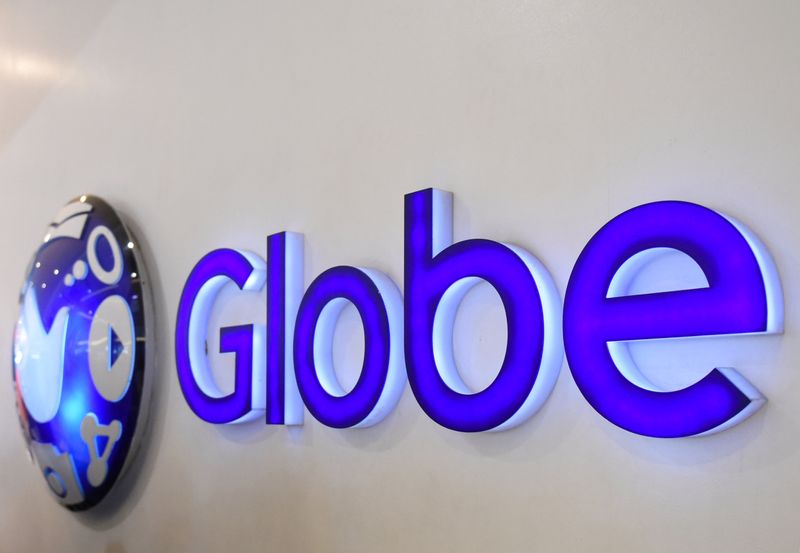 &copy; Reuters. FILE PHOTO: A logo of Globe Telecom is seen at a Globe service center in Edsa, Quezon City, metro Manila, Philippines, May 7, 2018. Picture taken May 7, 2018. REUTERS/Dondi Tawatao