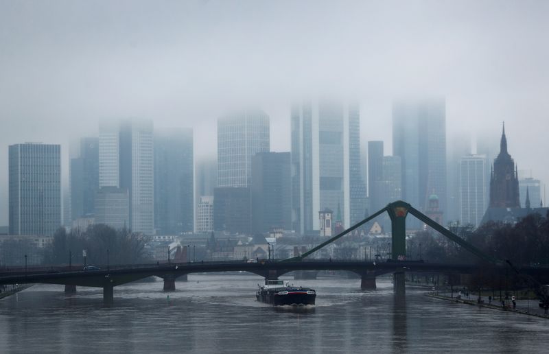 &copy; Reuters. FILE PHOTO: The city's financial district high-rise buildings disappear in clouds as the spread of the coronavirus disease (COVID-19) continues during an extended lockdown and a demand by the German government for more home office possibilities in Frankfu