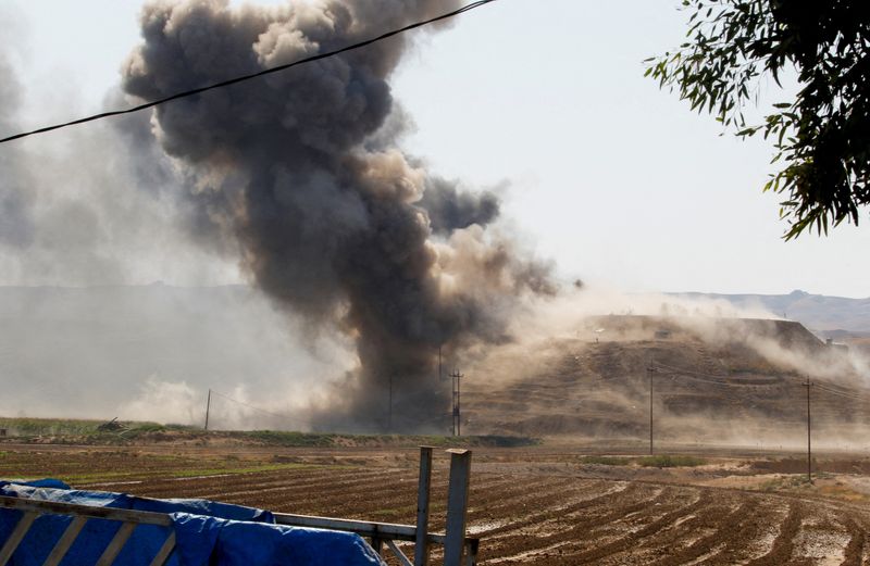 &copy; Reuters. Smoke rises from the Iraqi Kurdistan headquarters of the Kurdish Democratic Party of Iran, after Iran's Revolutionary Guards' strike on the outskirts of Kirkuk, Iraq September 28, 2022. REUTERS/Ako Rasheed
