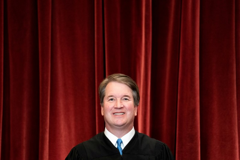 © Reuters. FILE PHOTO: Associate Justice Brett Kavanaugh poses during a group photo of the Justices at the Supreme Court in Washington, April 23, 2021.   Erin Schaff/Pool 