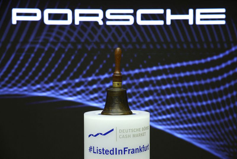 &copy; Reuters. FILE PHOTO: The opening bell is displayed under a logo of German car manufacturer Porsche prior to Porsche's IPO at the stock exchange in Frankfurt, Germany, September 29, 2022.  REUTERS/Kai Pfaffenbach