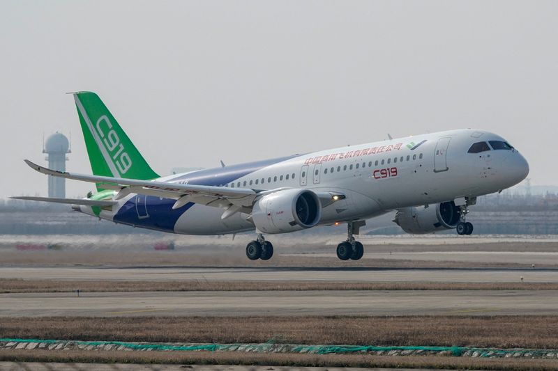 &copy; Reuters. FILE PHOTO: The third prototype of China's home-built passenger jet C919 takes off during its first test flight at Shanghai Pudong International Airport in Shanghai, China December December 28, 2018. REUTERS/Stringer/File Photo