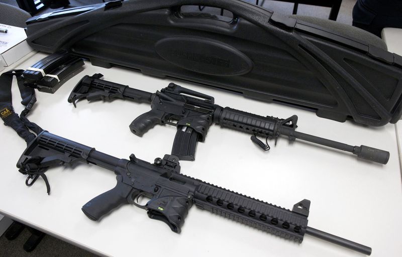 &copy; Reuters. FILE PHOTO: A Bushmaster semi-automatic assault rifle (top) and a Smith & Wesson semi-automatic rifle are turned in during a gun buyback event at the New Haven Police Academy in New Haven, Connecticut, December 22, 2012.  REUTERS/ Michelle McLoughlin/File