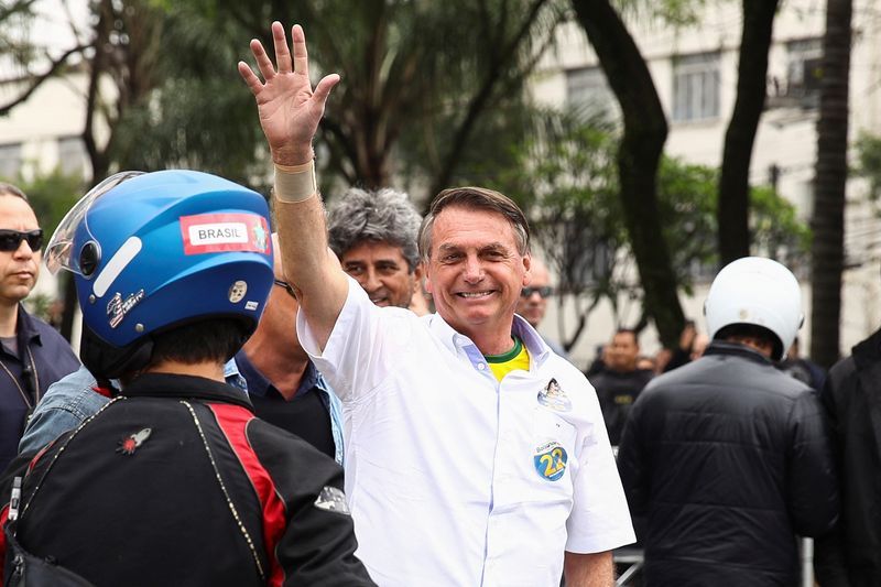 &copy; Reuters. Presidente Jair Bolsonaro durante motociata em São Paulo na véspera do 1º turno das eleições
01/10/2022
REUTERS/Carla Carniel