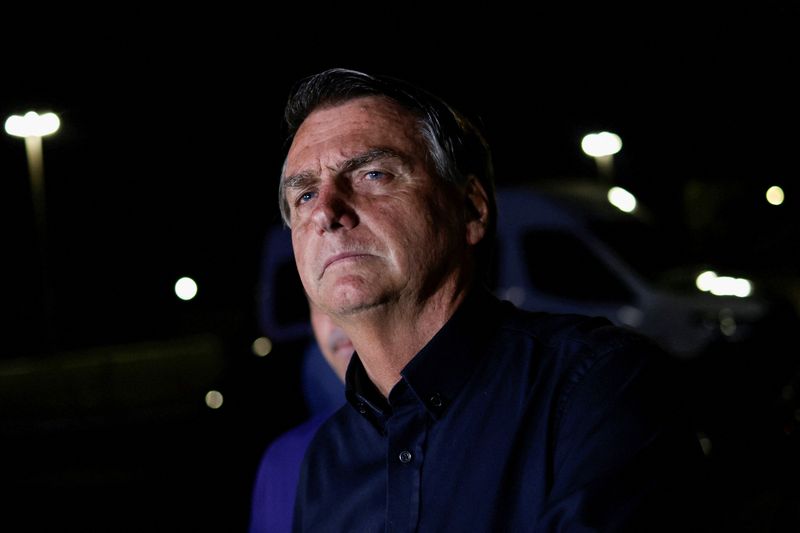 © Reuters. Brazil's President and presidential candidate Jair Bolsonaro speaks after the results of the first round of Brazil's presidential election, at the Alvorada Palace in Brasilia , Brazil October 2, 2022. REUTERS/Ueslei Marcelino  