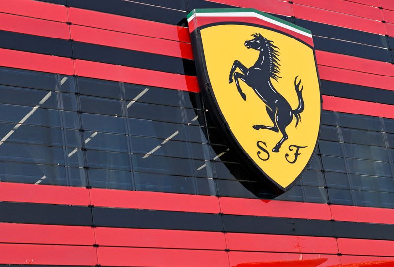 © Reuters. FILE PHOTO: The logo of Ferrari is seen in the headquarters as CEO Benedetto Vigna unveils the company's new long term strategy, in Maranello, Italy, June 15, 2022. Picture taken June 15, 2022. REUTERS/Flavio Lo Scalzo/File Photo