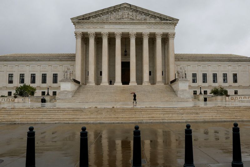 &copy; Reuters. FILE PHOTO: A general view of the U.S. Supreme Court building in the rain the day before the start of the court's new term in Washington, U.S. October 2, 2022.  REUTERS/Jonathan Ernst/File Photo