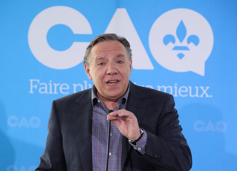 &copy; Reuters. FILE PHOTO: Quebec Premier Francois Legault speaks to the media following his closing speech at the CAQ national convention in Drummondville, Quebec, Canada May 29, 2022.  REUTERS/Christinne Muschi/File Photo