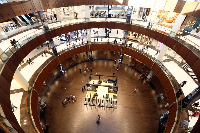 &copy; Reuters. FILE PHOTO: People shop at The Dubai Mall, in Dubai, United Arab Emirates March 12, 2020. Picture taken March 12, 2020. REUTERS/Satish Kumar