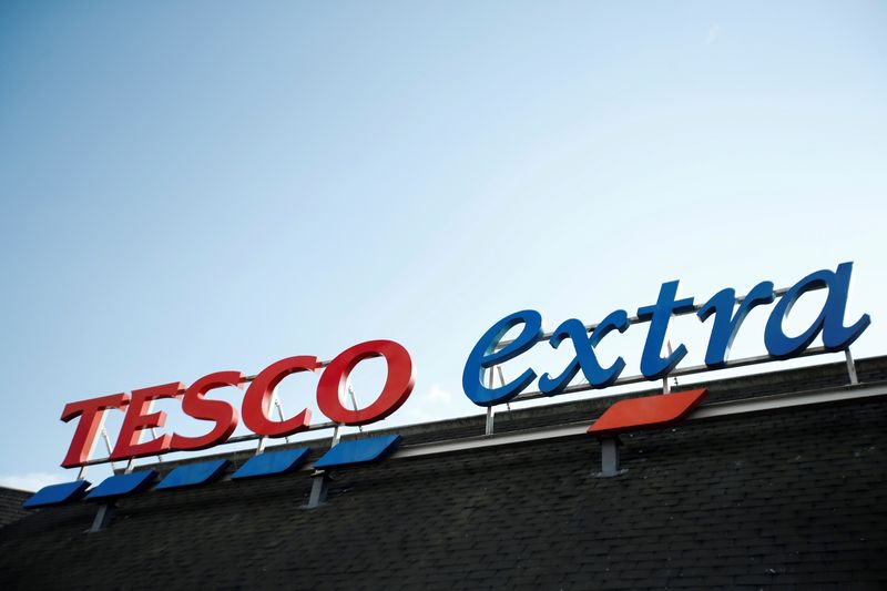 Tesco lowers profit sights as British shoppers face winter crunch