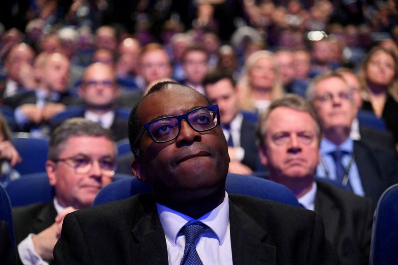 &copy; Reuters. Chancellor of the Exchequer Kwasi Kwarteng listens to British Prime Minister Liz Truss give a speech, during Britain's Conservative Party's annual conference in Birmingham, Britain, October 5, 2022. REUTERS/Toby Melville