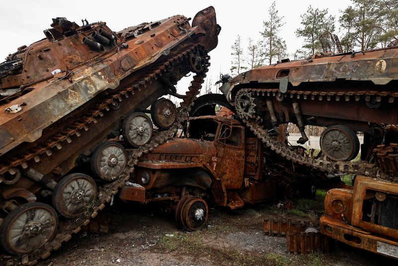 Russian bodies, shattered vehicles mark Moscow's loss of Ukrainian town