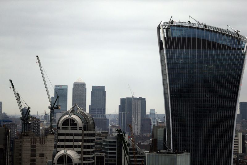 &copy; Reuters. FILE PHOTO: A view of the London skyline shows the Canary Wharf financial district of London (in the background) and the Walkie Talkie building (R), in the City of London, seen from St Paul's Cathedral in London, Britain February 25, 2017. REUTERS/Neil Ha